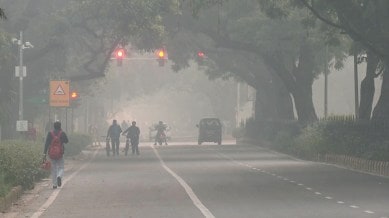 Delhi News LIVE Updates: View of Lodhi Road cover with smog as the air quality index (AQI) level remains in the 'Very poor' category, in New Delhi on Friday.