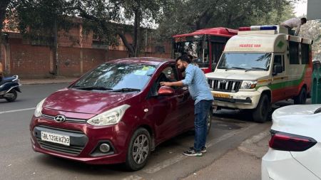 An individual performing court-mandated community service as a hospital guard at Lok Nayak Hospital. Express photo