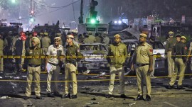 Police personnel at the site after the car blast blast near Red Fort (Source: PTI Photo)