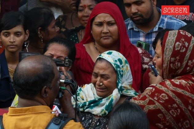Female fan breaks down outside the Pawan Hans Crematorium in Vile Parle, Mumbai