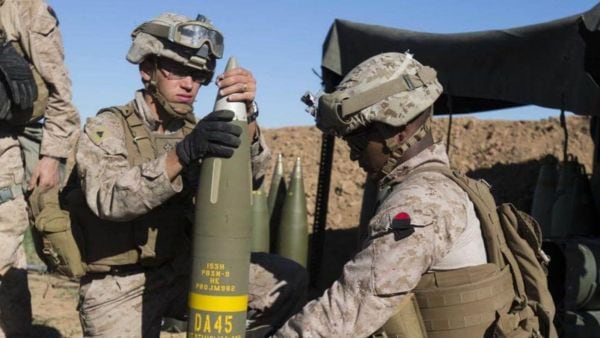 The US Marine Corps prepare an Excalibur 155 mm projectile round on Fire Base Bell, Iraq, while conducting fire missions. (File Photo: US Marine Corps)