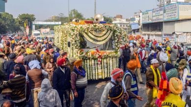 Devotees participate in the Nagar Kirtan procession, commemorating the 350th martyrdom anniversary of Shri Guru Tegh Bahadur Sahib Ji, as it reaches Guru Nanak Mission Chowk, in Jalandhar (ANI Photo)