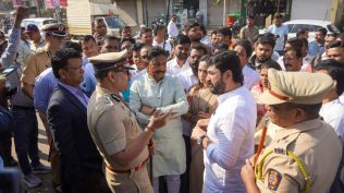 Pune MP and Union minister Muralidhar Mohol with city Police Commissioner and other officials at the accident spot near Navle bridge (Express Photo)