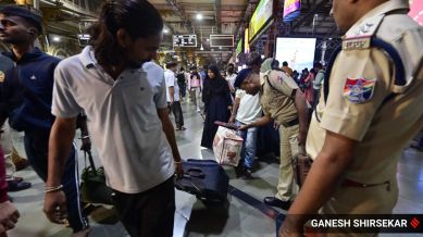 Security personnel patrol the CSMT station as Mumbai has been put on high alert after the Delhi blast, in Mumbai on 10 November 2025. Express photo by Ganesh Shirsekar