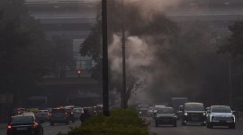 Water sprayers install to control air pollution
