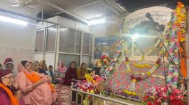 Gurudwara Dashmesh Darbar is a humble structure with corrugated tin roof held up by metal pillars.