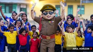 Singam mascot with students during a fun fair organised by Bharat Scout and guide on the eve of Children’s day. Express photographs by Arul Horizon. 13/11/25, Pune.
