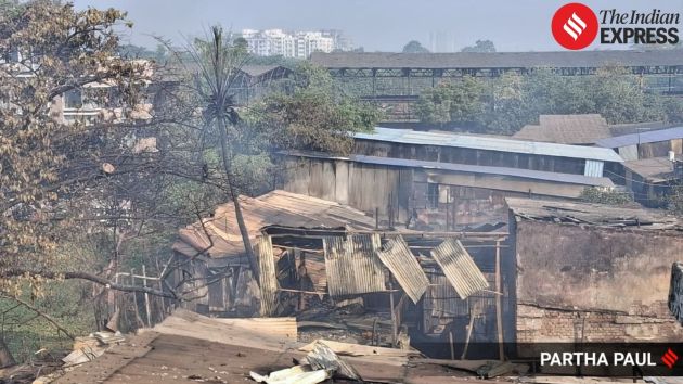 At least 15 fire engines are pressed into service overnight to bring the warehouse fire under control,