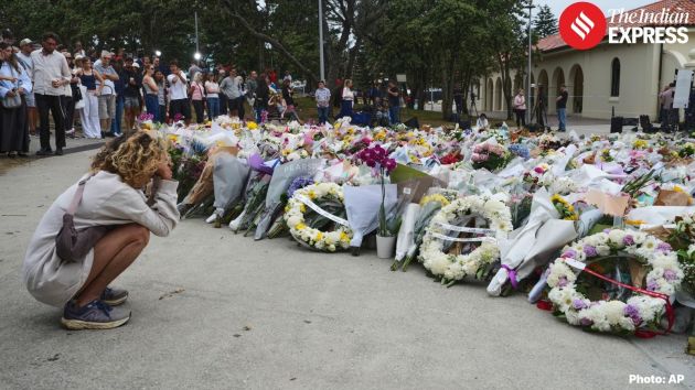 Floral tributes and candles are placed near the Bondi Pavilion at Bondi Beach,