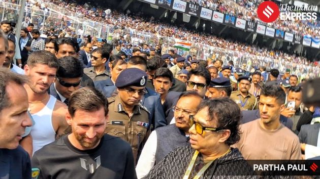 Messi makes a brief on-stage appearance, greeting attendees but not engaging extensively with the crowd