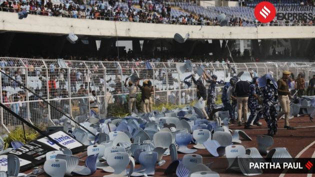 Disorder breaks out within the stadium as some fans throw objects and damage property,