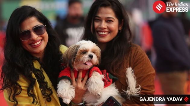 Pet parents pose with their dogs as part of the celebrations at India’s biggest pet gathering of the year