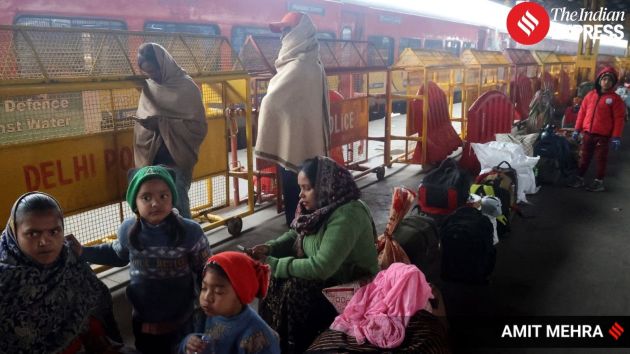Commuters were seen waiting on crowded platforms at the station