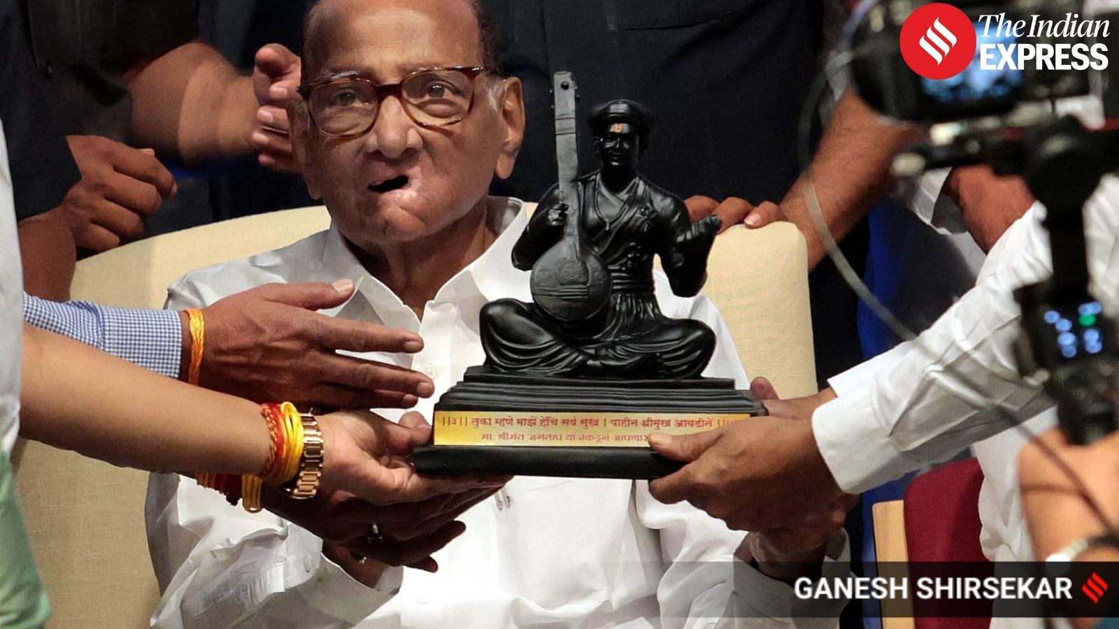 Snapshots show Pawar smiling and acknowledging greeting