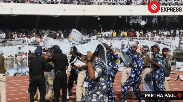 After Messi’s departure, damaged seating and scattered debris are seen inside the stadium