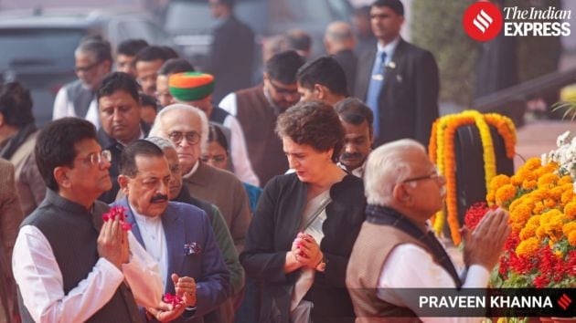 Union ministers Kiren Rijiju, Jitendra Singh, and Arjun Ram Meghwal line up to place flower petals before photographs of the personnel killed during the attack