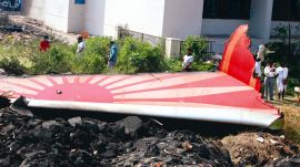 Ahmedabad plane crash, Ranchhod Makwana, community resilience, IGP Compound tragedy, coping with trauma, post-crash recovery, BJ Medical College, memorial for victims, Ahmedabad local businesses, plane accident impact