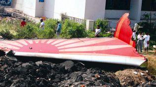 Ahmedabad plane crash, Ranchhod Makwana, community resilience, IGP Compound tragedy, coping with trauma, post-crash recovery, BJ Medical College, memorial for victims, Ahmedabad local businesses, plane accident impact