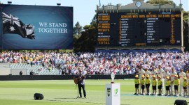 The crowd pauses for a moment to honour the Bondi shooting victims during play on day one of the third Ashes cricket test between England and Australia at the Adelaide Oval in Adelaide, Australia, Wednesday, Dec. 17, 2025. (AP Photo)