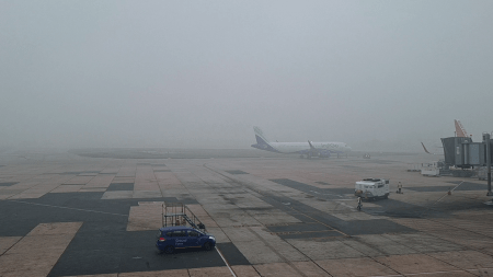 Poor visibility at the Indira Gandhi International airport runway due to dense fog, in New Delhi on Tuesday.