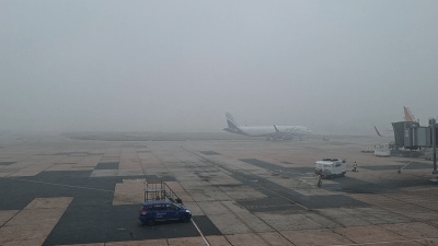 Poor visibility at the Indira Gandhi International airport runway due to dense fog, in New Delhi on Tuesday.