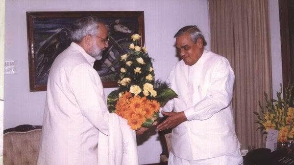 Narendra Modi visits Atal Bihari Vajpayee in New Delhi after becoming the Chief Minister of Gujarat. (Express archive)
