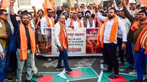 Bajrang Dal activists protest the alleged killing of a Hindu youth and atrocities against minority Hindus in Bangladesh, in Nagpur.