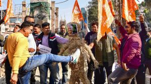 Members of Bajrang Dal stage a protest against Chief Adviser of Bangladesh Muhammad Yunus over the alleged attacks on Hindus in Bangladesh, in Guwahati,