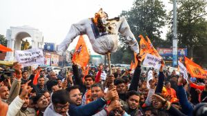Vishva Hindu Parishad and Bajrang Dal members burn an effigy at Hazratganj crossing in Lucknow on Wednesday during a protest against the mob lynching of Dipu Chandra Das and the alleged atrocities against Hindu minorities in Bangladesh.