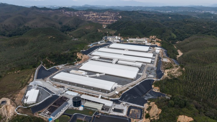 An industrial pig farm built as part of a crackdown on pollution and smuggling on top of what was once an illegal rare earth mine in Baishazhen, south-central China,
