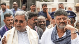 Karnataka C M Siddaramaiah and Deputy C M DK Shivakumar speak to the media after second round of breakfast meeting amid leadership tussle in the state, in Bengaluru, Tuesday, Dec. 2, 2025. (PTI Photo)