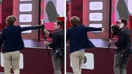 Magnus Carlsen shoves a camera after losing a game at World Rapid and Blitz Championship in Doha. (Screengrab/Instagram - ChessbaseIndia)