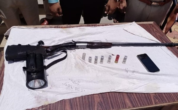 The police found a 9 mm rifle, six live cartridges, and one empty cartridge in their possession. (Express Photo)