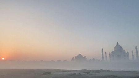 A layer of fog blankets the Taj Mahal in Agra UP.