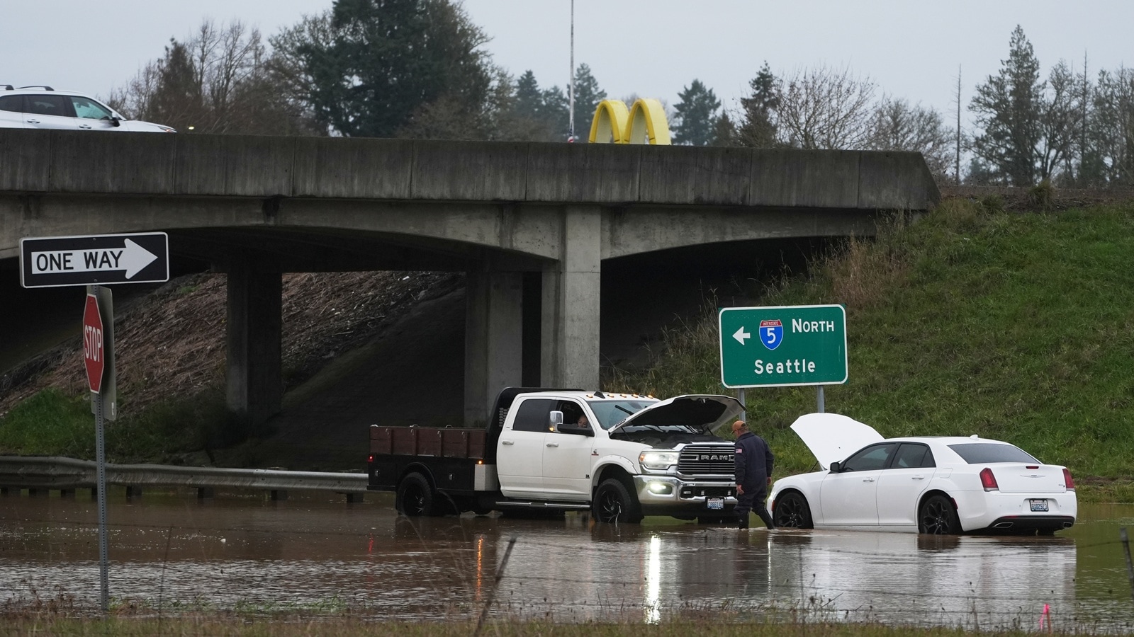 Record flooding threatens Washington as more heavy rain pounds the Northwest