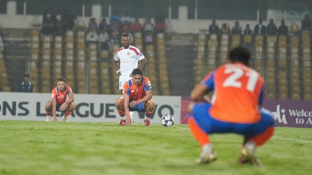 FC goa players pause before starting match