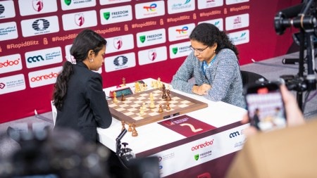 India's Savitha Shri B and Koneru Humpy during World Rapid Championship in Doha. (PHOTO: FIDE/Lennart Ootes)