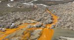 In an image provided by the USGS, A tributary of the Kugaaruk River in northern Alaska turning orange from elevated heavy metal concentrations. Record-setting temperatures and rainfall in the Arctic over 2025 sped up the melting of permafrost and washed toxic minerals into more than 200 rivers across northern Alaska, threatening vital salmon runs, according to a report card issued by federal scientists. (Image: The New York Times)