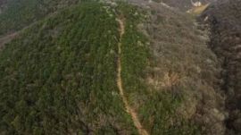 Archaeologists uncovered straight, continuous trench passes, reinforced slopes made of rammed earth, compacted roadbeds and valleys that had been deliberately filled to maintain a level route. (image: SCMP/ Handout)