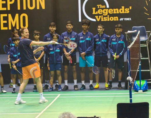 Peter Gade teaching his double action shot to kids in Siri Fort Complex, New Delhi. (ExpressPhoto/Pritish Raj)