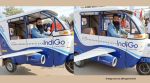 The man drives the customised auto solo, flashes a thumbs-up, and then the auto rickshaw lifts off the ground