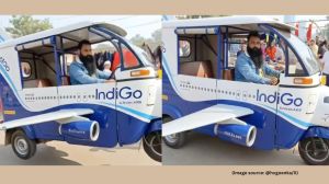 The man drives the customised auto solo, flashes a thumbs-up, and then the auto rickshaw lifts off the ground
