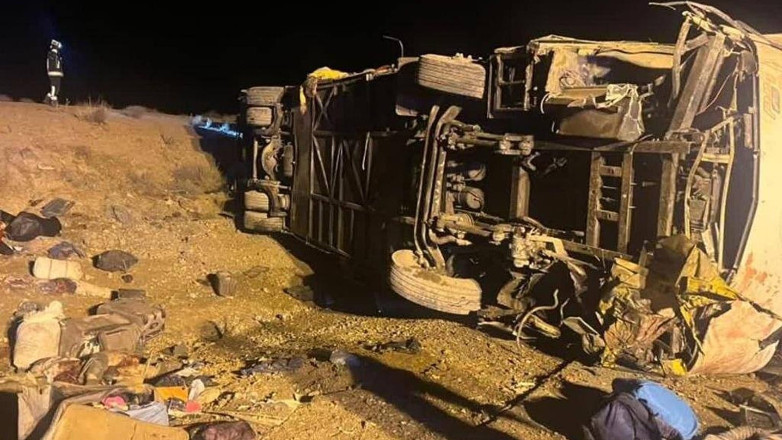 Bus crash kills 13, injures over a dozen on highway in central Iran
