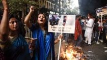 Protesters during a protest rally against the Chief Adviser of the Government of Bangladesh, Muhammad Yunus, over the alleged atrocities against minorities in Bangladesh, in Kolkata on Monday. (ANI Photo)