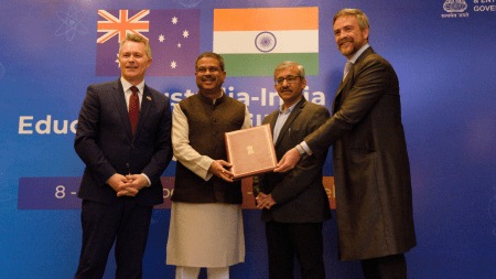L-R: Australian MP Jason Clare, Union Minister of Education Dharmendra Pradhan, hands over LOI to Prof Atilla Brungs of UNSW Sydney (Photo via UNSW)