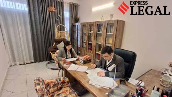 Lawyer couple Yogita and Vineet share the same study to prepare for the day's cases.