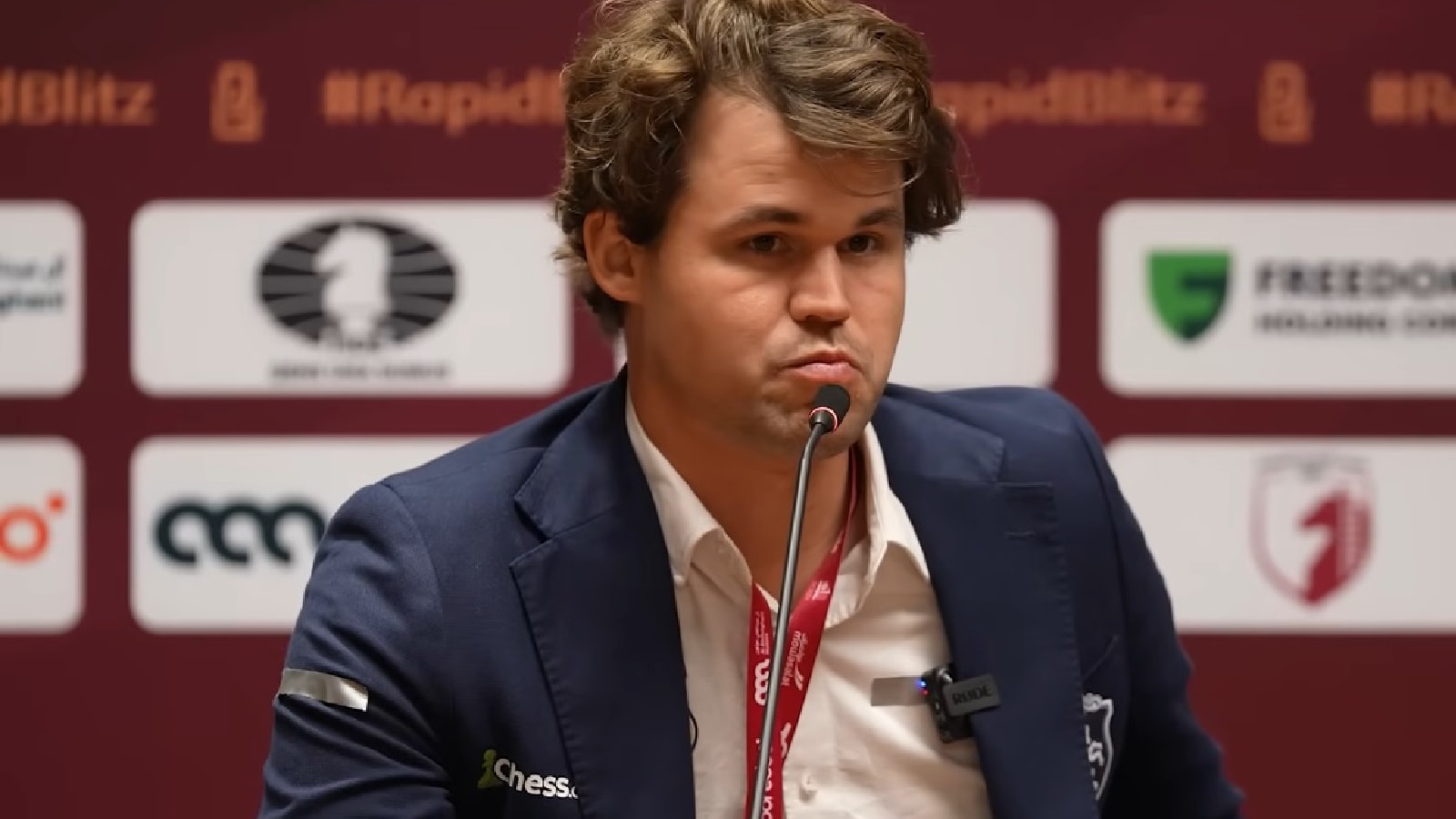Magnus Carlsen tapes over betting sponsor logo to avoid fresh war with FIDE in Doha