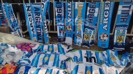 Lionel Messi scarves and jerseys being sold near the Salt Lake Stadium. (Express Photo | Sayak Dutta)
