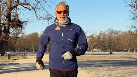 Milind Soman running outdoors in cold weather