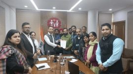 NHM state comittee members giving memorandum of demand to Ghanshyam Thori, mission director NHM at Chandigarh. (Express Photo)
